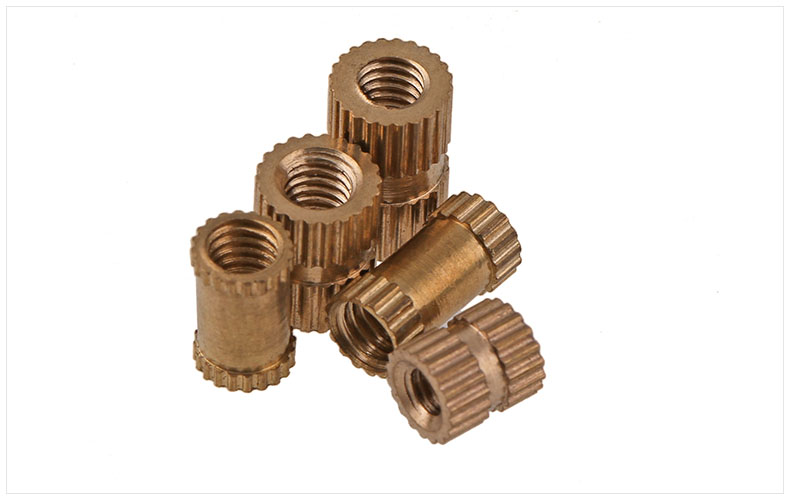 Injection molded embedded copper nut